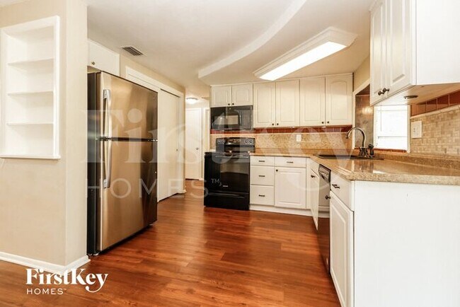 Building Photo - 4125 Woodsville Dr