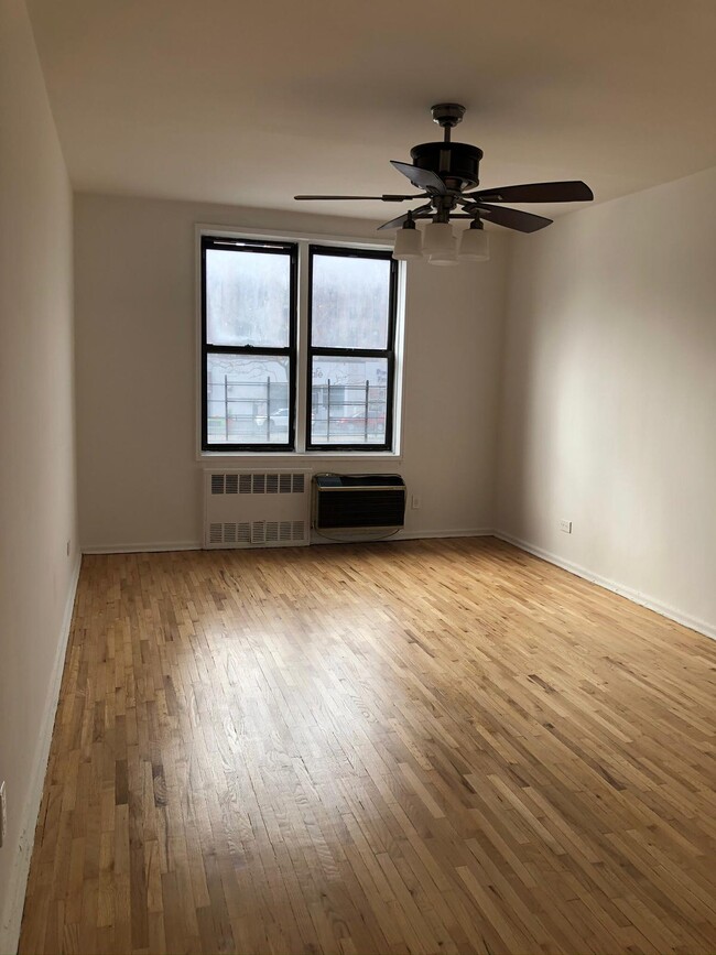 Building Photo - 10025 Queens Blvd