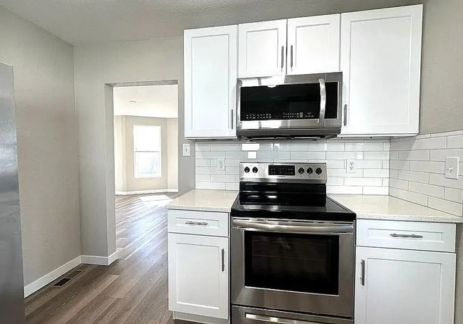 Building Photo - Modern Pet-Friendly Home with Fenced Yard in Central Pueblo!