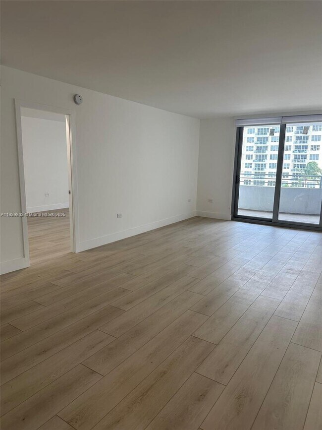 Building Photo - 5555 Collins Ave