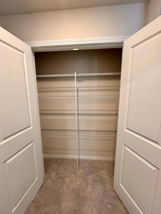 Building Photo - 4BR/2.5BA in Steel Creek's Brightwater Neighborhood