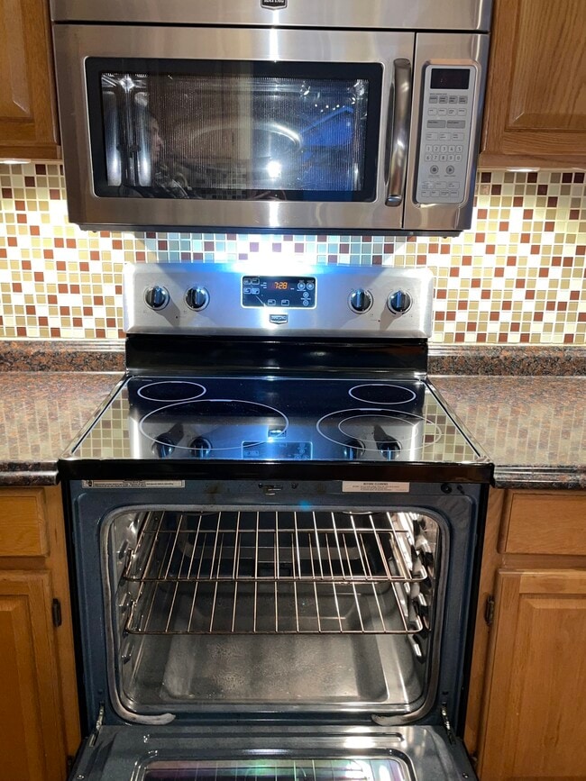 kitchen with fridge, oven, microwave, and dishwasher - 2310 Old Berwick Rd