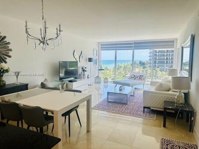 Building Photo - 10275 Collins Ave