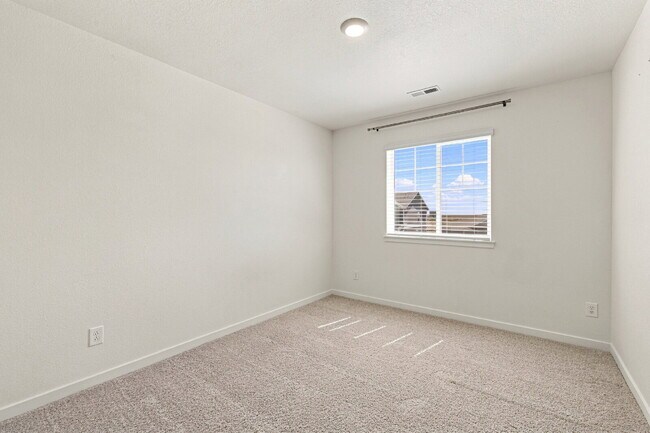 Building Photo - Spacious 4 Bedroom, 2.5 Baths in Bennett! 3 Car Attached Garage. Corner Lot!