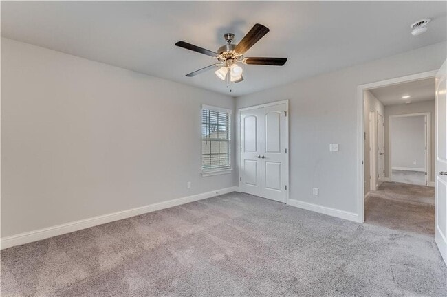 Building Photo - Minutes from I-49! 4BR/2.5BA Home