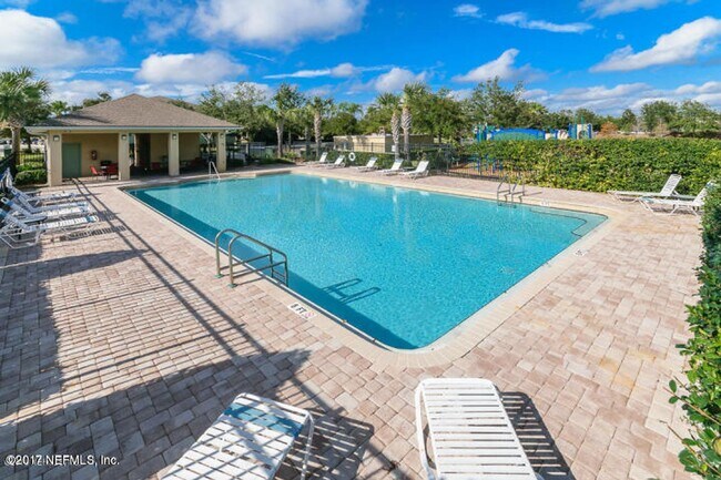 Building Photo - Spacious 3 bedroom condo located in a gated community off of Beach Boulevard