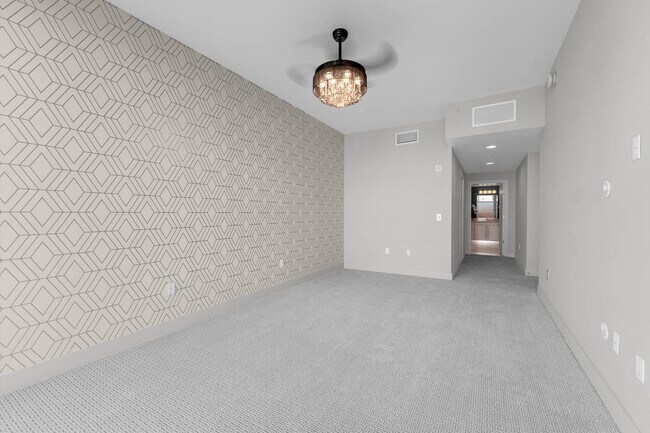 Building Photo - “Sleek Design Meets Walkable Downtown Livi...