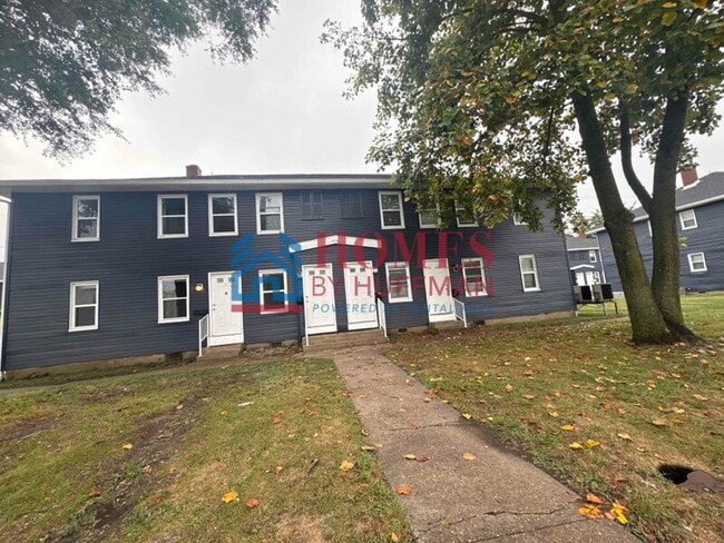 Building Photo - One Bedroom Apartment | Laundry Facility | Utilities Included