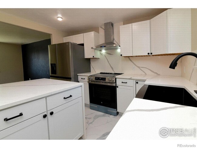 Building Photo - Remodeled home with separate finished base...