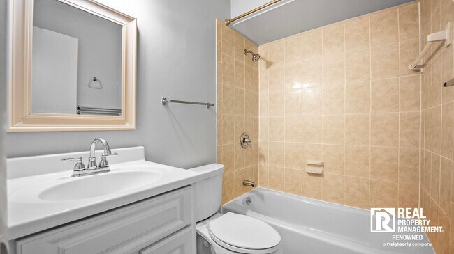 Building Photo - Lovely 4 BR/2.5 BA Split-level in Quite Ne...