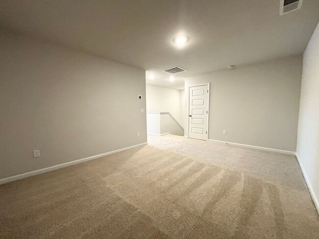 Building Photo - ABSOLUTELY BEAUTIFUL BRAND-NEW BUILD TOWNHOME