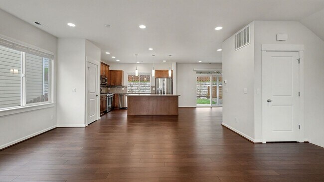 Building Photo - Brightview 4-Bedroom with Main-Floor Bedroom, 3-Car Garage, and Exceptional Outdoor Space