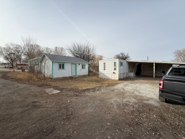 Building Photo - 2 Bedroom 1.5 Semi-Rural Mobile Home with Workshop on Large Lot