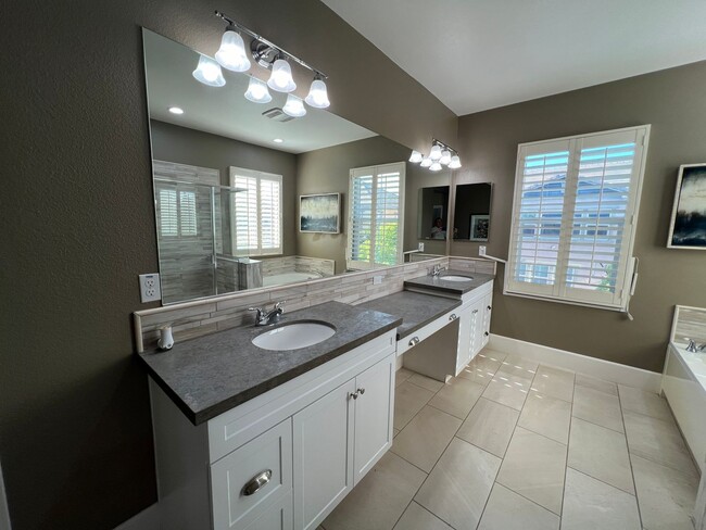 Building Photo - Former model home with tons of upgrades in...