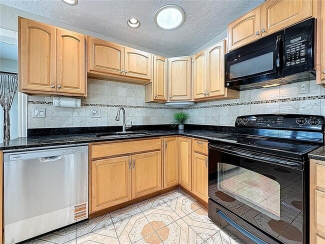 Building Photo - 6709 Orchard Dr N