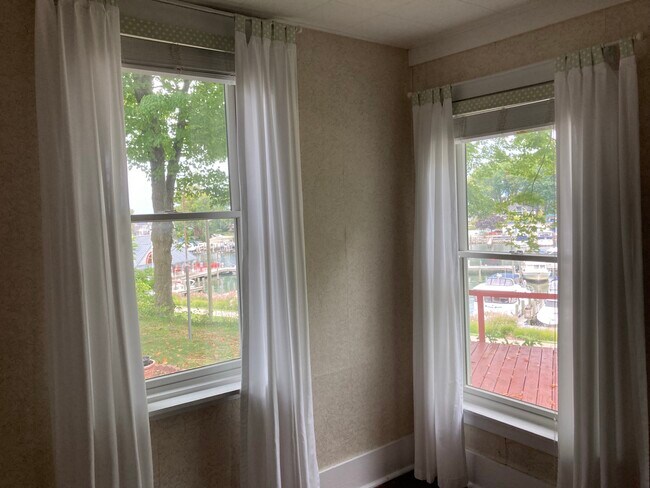 Bedroom with view of marina (boats and docks not included) - 317 Eagle St