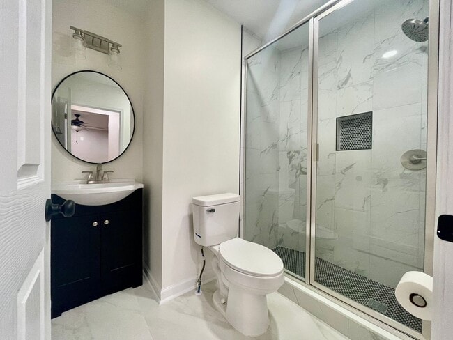 Building Photo - Welcome to this stunning 3-bedroom, 2-bath...