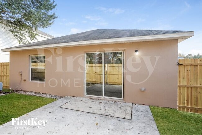 Building Photo - 6671 Gentle Oaks Dr N