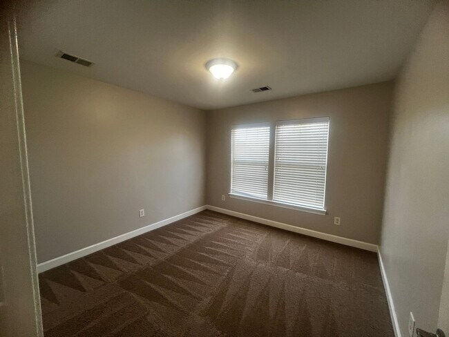 Building Photo - AVAILABLE NOW IN BRIGHTON WOODS!