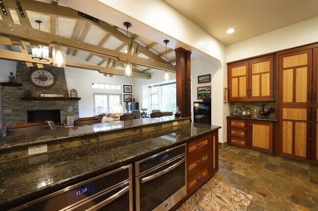 Building Photo - Don't miss this amazing opportunity to rent a higher end home nestled in the trees in the coveted...