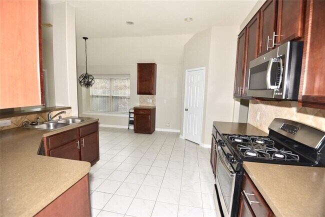 Building Photo - 9944 Western Ridge Way