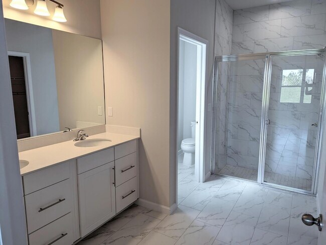 Building Photo - 10597 SW Vasari Way