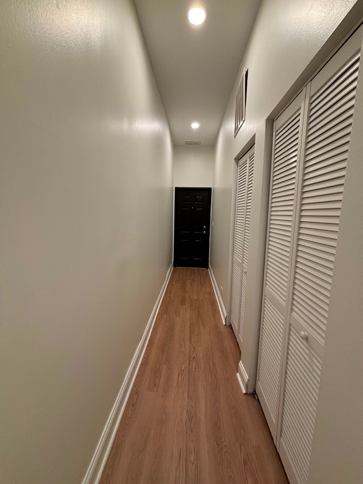 Back hallway with in unit laundry and leads to private back deck - 2608 W Evergreen Ave