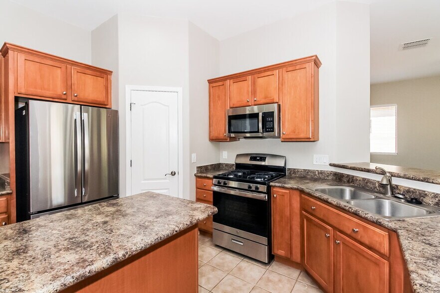 Building Photo - 6498 W Castle Pines Way