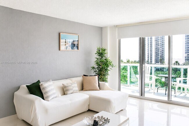 Building Photo - 19370 Collins Ave