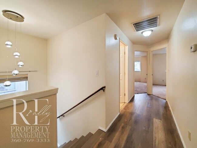 Building Photo - Modernized Two-Story with Open Layout, Gas Fireplace & Large Fenced Yard