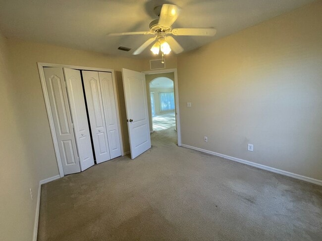 Building Photo - PRICE REDUCTION: Spacious and Charming 3 B...