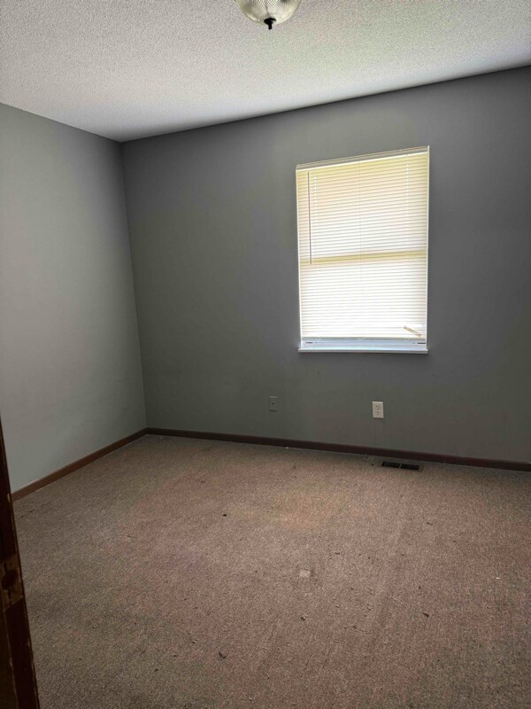 Building Photo - 8701 N Raintree Ct