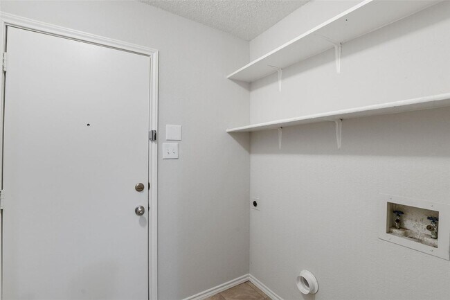 Building Photo - Welcome to this stunningly updated, three-bedroom, two-bath home located in the desirable Valley ...