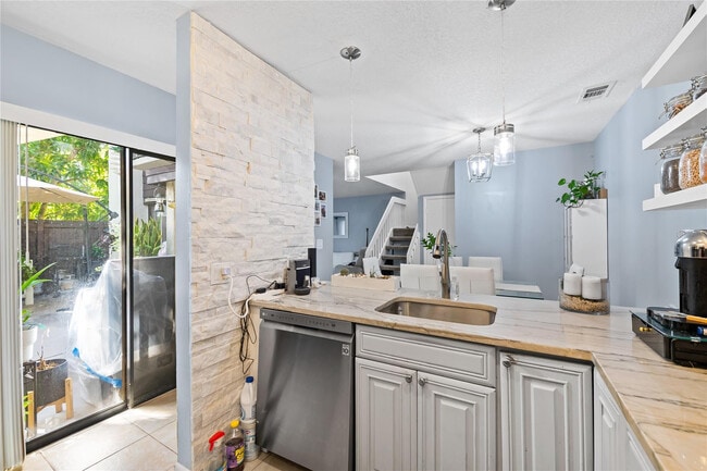 Building Photo - 3387 Cocoplum Cir