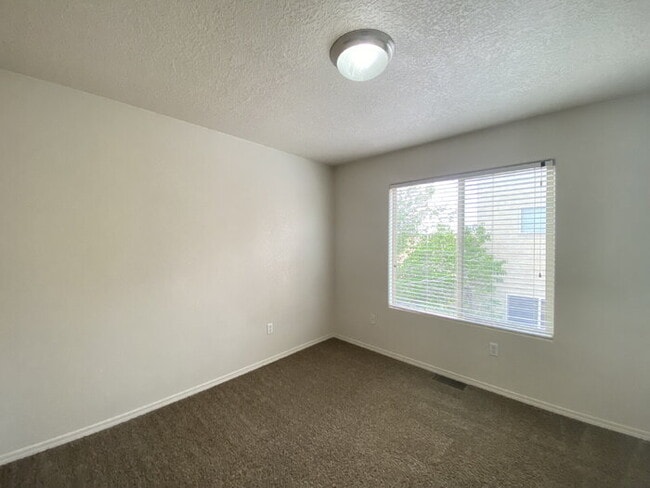 Building Photo - GATED COMMUNITY - 2 Story Townhouse - All BR Upper Level