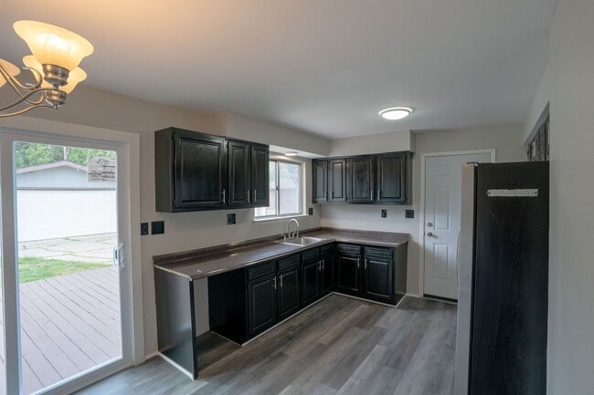 Building Photo - Must see FOUR bedroom Trilevel home