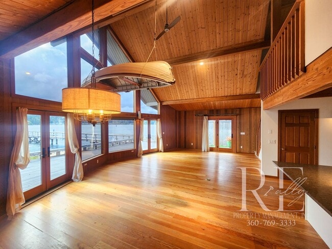 Building Photo - Waterfront Living in Indianola – Dock, Bea...