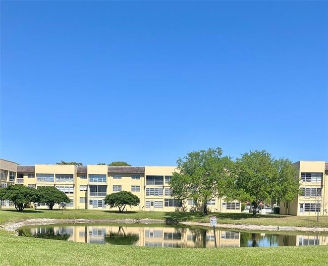 Building Photo - 6090 NW 64th Ave