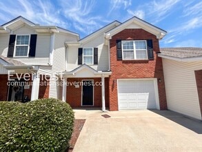 Building Photo - 2 Bed, 2.5 Bath Home with Fenced Yard & Garage / Available Now!