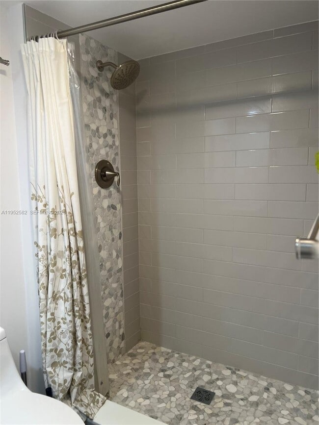 Building Photo - 3675 N Country Club Dr