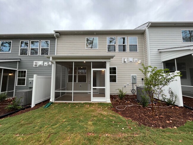 Building Photo - Newly Built 4BD, 3BA Cary Townhome with Modern Amenities and Screened-In Patio
