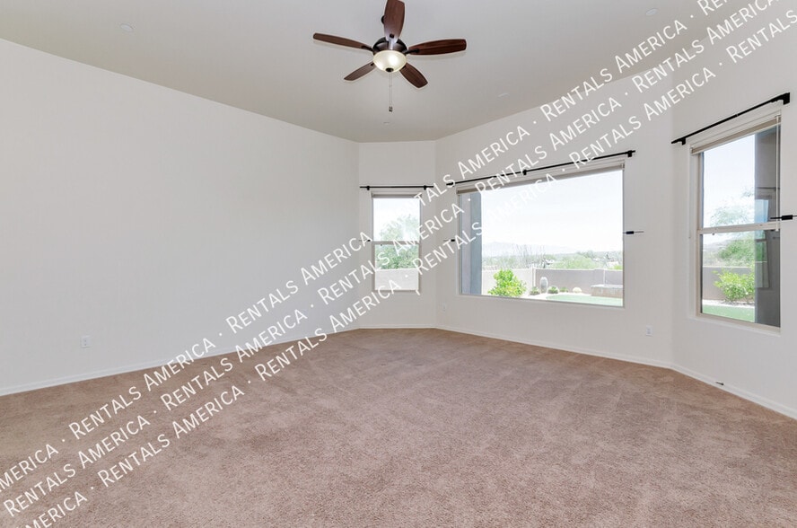 Building Photo - 9441 E Purple Orchid Pl