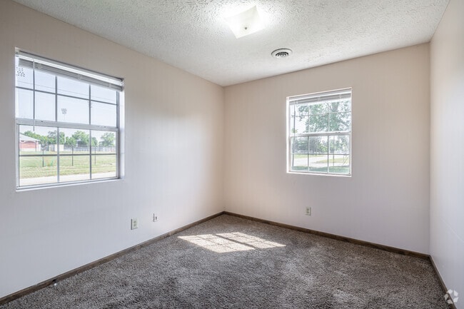 2BR, 1BA - 700SF - Bedroom - Riverside Apartments
