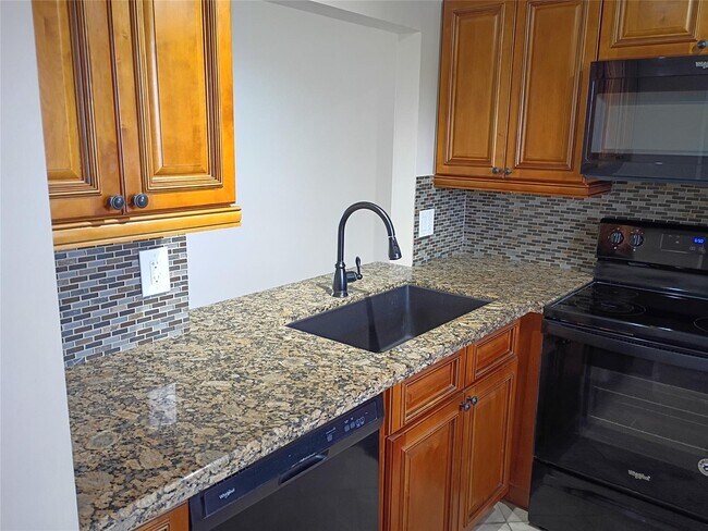 Primary Photo - Stylish Remodeled Condo with Scenic Water ...