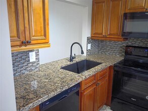 Building Photo - Stylish Remodeled Condo with Scenic Water ...