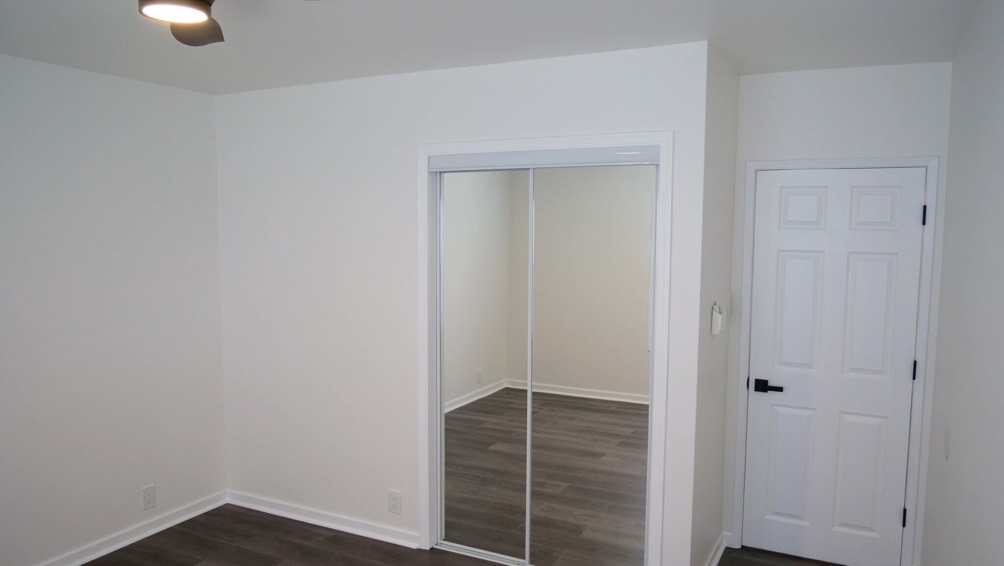 Another view of the built-in closet and the door closed. - 259 E Puente St