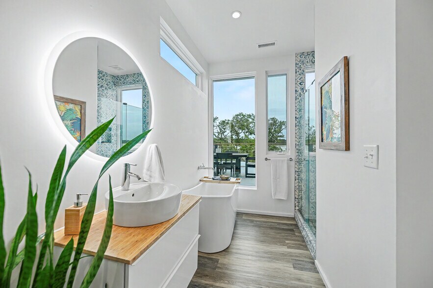 Primary ensuite bathroom with walk-in shower and tub - 2179 Sol Legare Rd