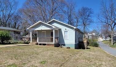 Building Photo - Charming 4BR Home with Modern Upgrades & Spacious Yard