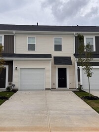 Building Photo - PRICE REDUCED! Modern 3-Bed Townhome in Gr...