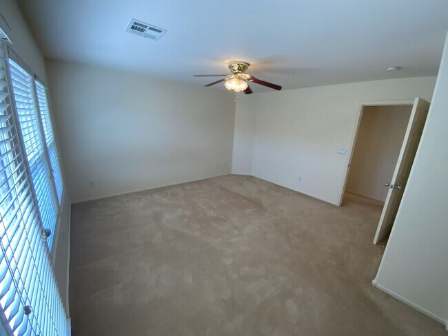 Building Photo - 4 bedrooms and 2.5 bathrooms 2-story home located in Henderson, NV!